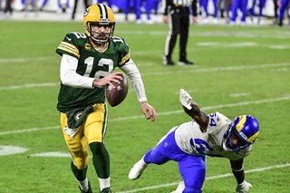 Rodgers, Packers on song as Rams downed in NFL playoffs