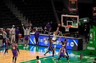 NBA: Lakers fend off late Celtics' flurry