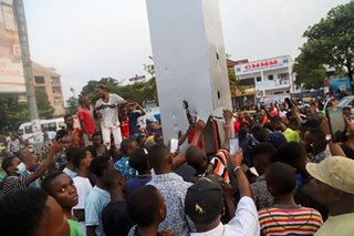 Silver monolith appears in Congo, prompting suspicion and selfies