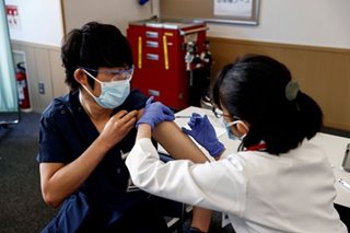 Japan finds more than 90 cases of new COVID-19 virus variant