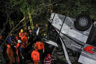Indonesia bus plunge kills 2 dozen pilgrims