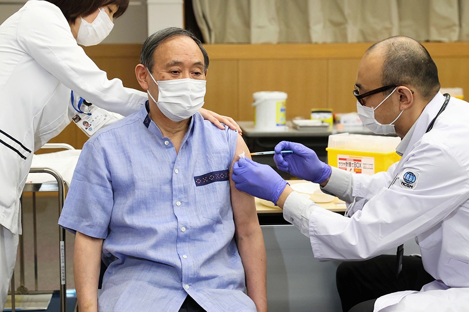 Japan PM Suga receives 1st shot of COVID-19 vaccine | ABS-CBN News