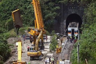 Clearing site of train accident in Taiwan