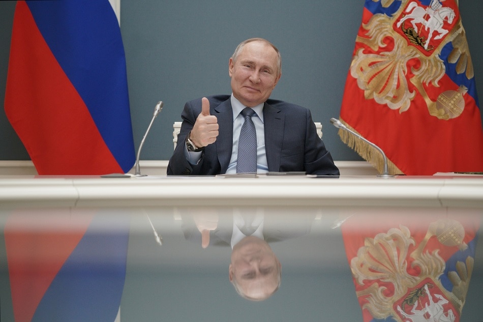 Putin signs law allowing him to serve 2 more terms