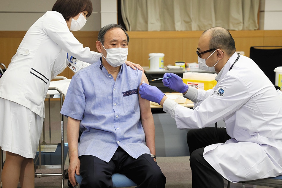 Japan PM Suga receives 2nd vaccine shot ahead of US trip 1