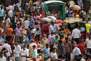 India faces record virus surge as Saudi restricts pilgrimages