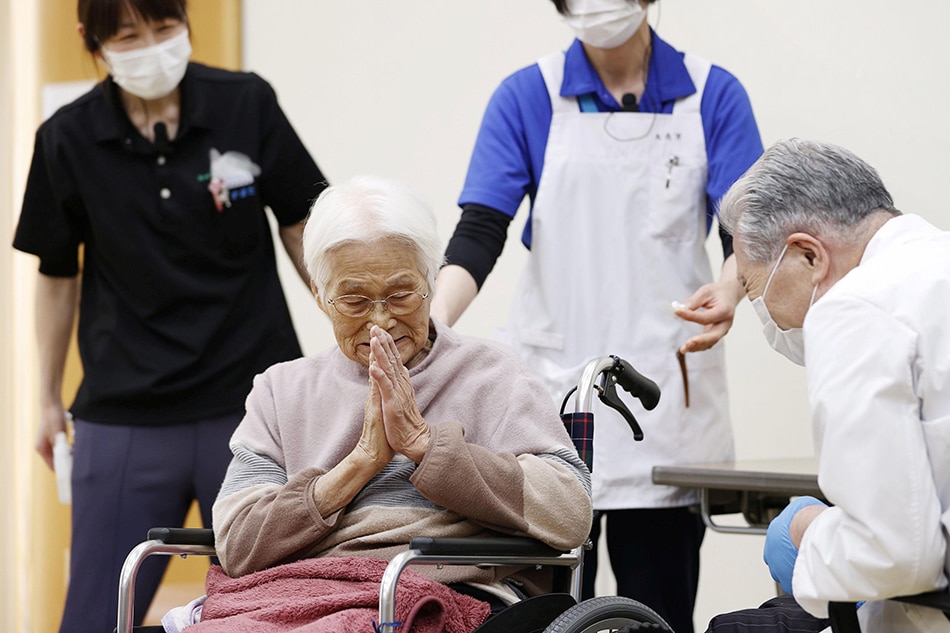 Japan begins COVID-19 shots for over 65s as 4th infection wave looms 1