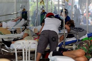 Philippine hospitals struggle to cope as more severe COVID-19 wave hits