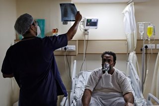 Trainee doctors in India pulled from exams to fight world's biggest COVID-19 surge