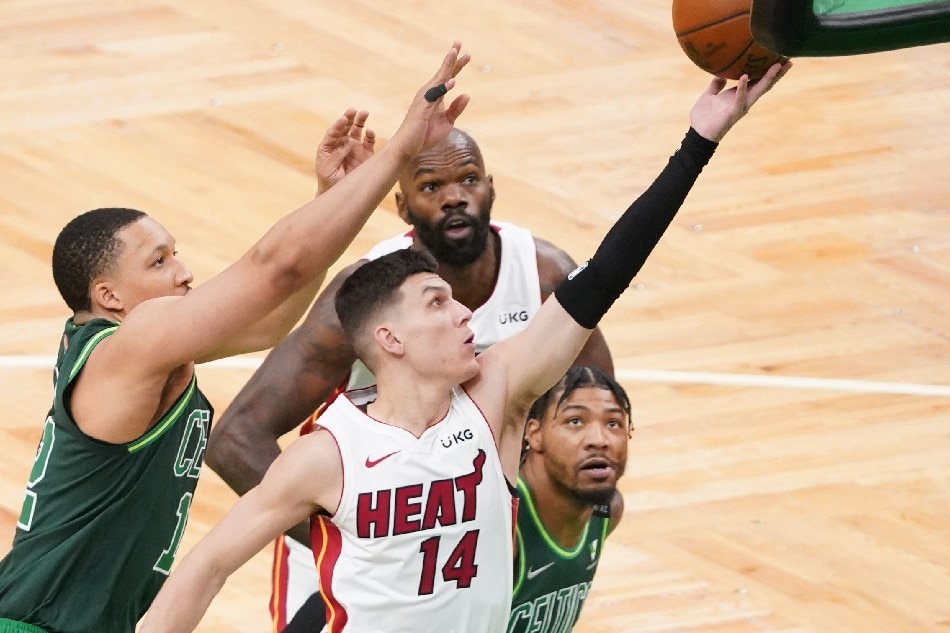 NBA: Heat clinch playoff spot with victory at Boston 1