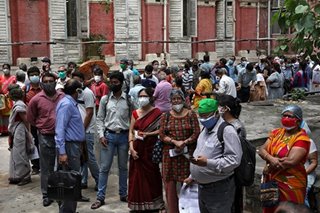 India's virus cases lower but WHO expert says positive tests ominously high