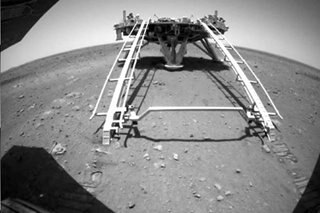 China says Martian rover takes first drive on surface of Red Planet