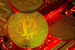 Bitcoin down almost 50 percent from year's high