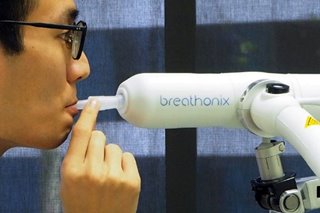 Singapore provisionally approves 60-second COVID-19 breathalyzer test