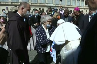 Pope kisses concentration camp tattoo on survivor's arm