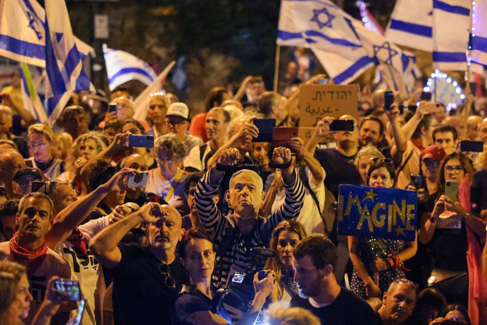 Demonstrators celebrate Israel's new coalition government