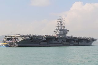 US Navy says carrier group operating in South China Sea