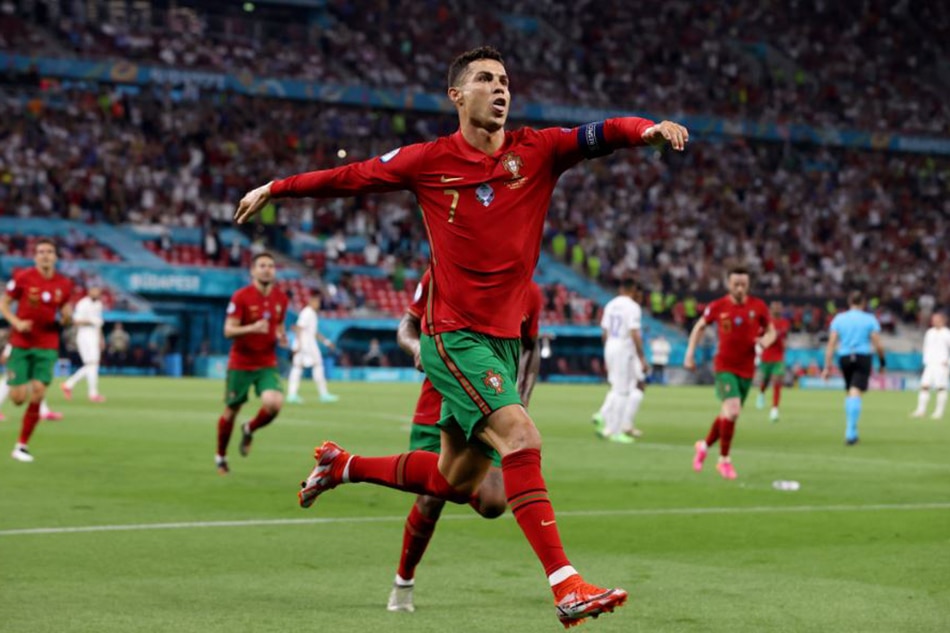 Football: Ronaldo equals international scoring record as Portugal edge into last 16 1