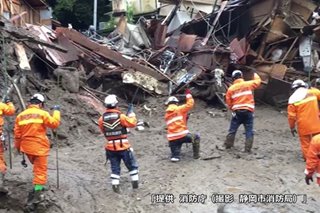 Rescue efforts continue after fatal mudslide rips central Japan city