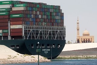 Ever Given container ship begins exit from Suez Canal 106 days after