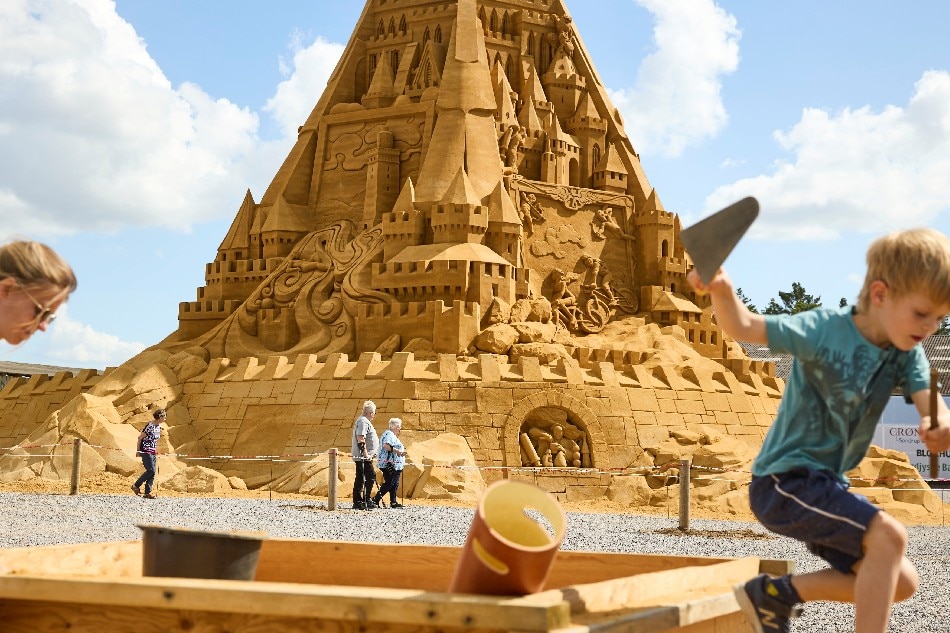 Inspired by COVID? World&#39;s tallest sandcastle built in Denmark | ABS-CBN  News
