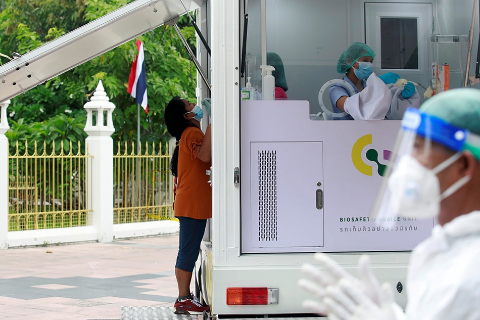 Thailand reports daily record of new coronavirus cases and new deaths 1