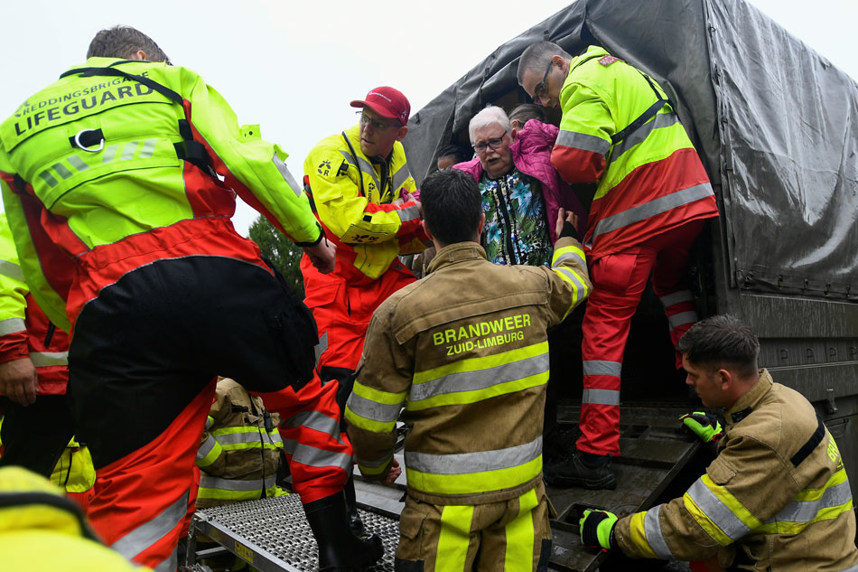 Dozens die in floods in western Europe, many missing 1