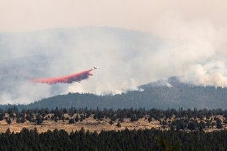 Major US wildfire grows, forcing new evacuations