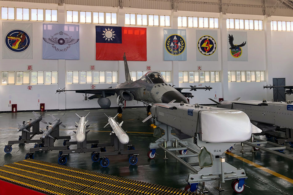  An Indigenous Defense Fighter (IDF) fighter jet and missiles are seen at Makung Air Force Base in Taiwan's offshore island of Penghu, September 22, 2020. Yimou Lee, Reuters/File