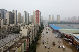 China braces for Typhoon In-Fa as it cleans up flood damage
