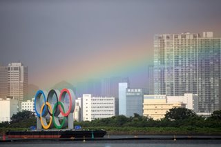 Olympic Rainbow as Japan braces for tropical storm