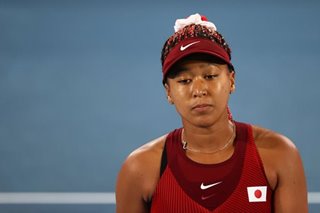 Osaka says 'I'm not God' after early Melbourne exit