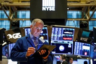 US stocks edge down on virus woes, slowing economy