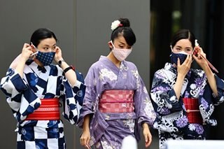 Japan signals COVID home quarantine policy rollback