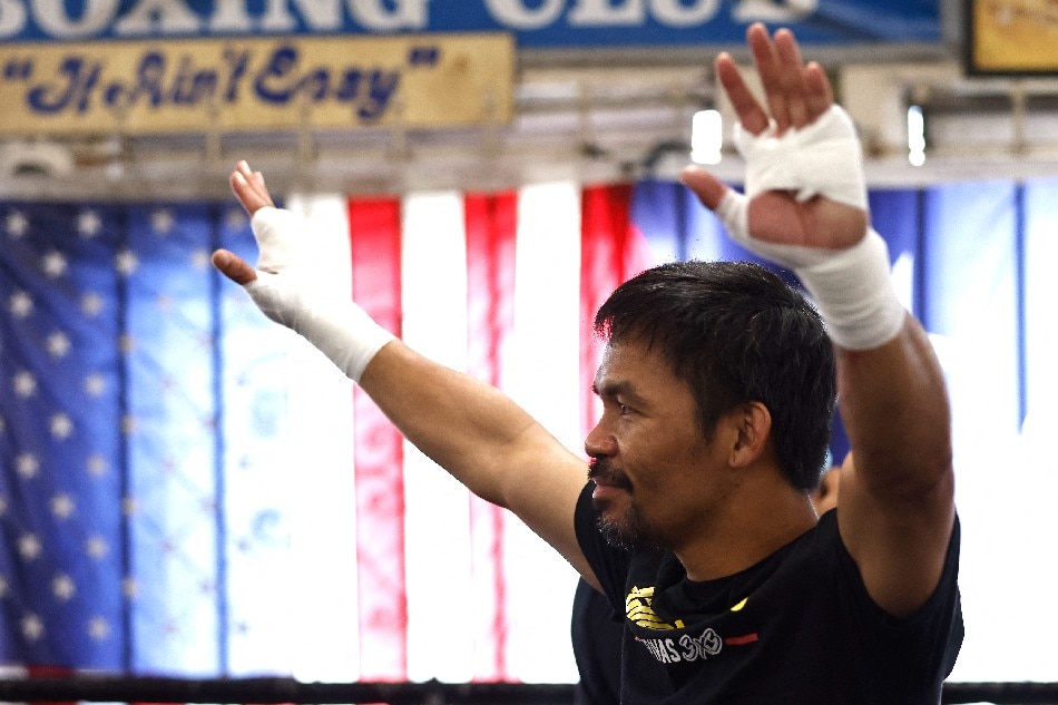 Manny Pacquiao poses for media at Wild Card Boxing Club in this August 4, 2021 file photo in Los Angeles, California. Michael Owens, Getty Images/AFP
