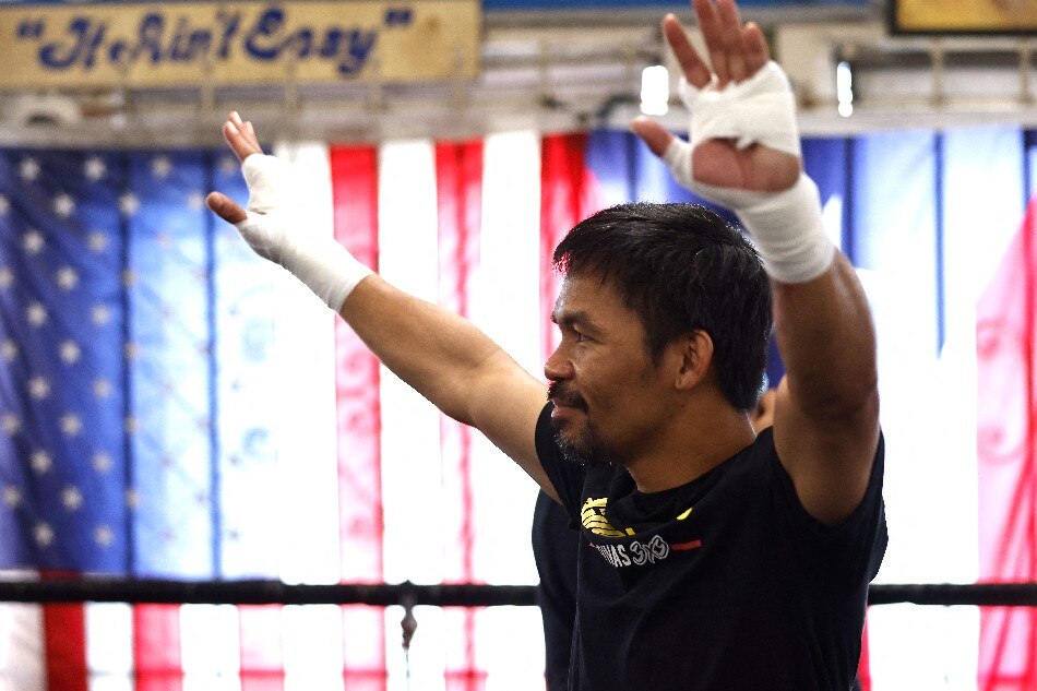 Manny Pacquiao poses for media at Wild Card Boxing Club on August 04, 2021 in Los Angeles, California ahead of his fight against Errol Spence Jr. on Aug. 21 at T-Mobile Arena in Las Vegas. File photo. Michael Owens, Getty Images/AFP