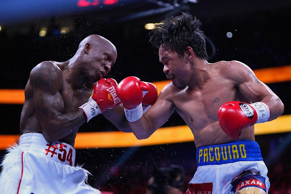 Manny Pacquiao (right) fights Yordenis Ugas