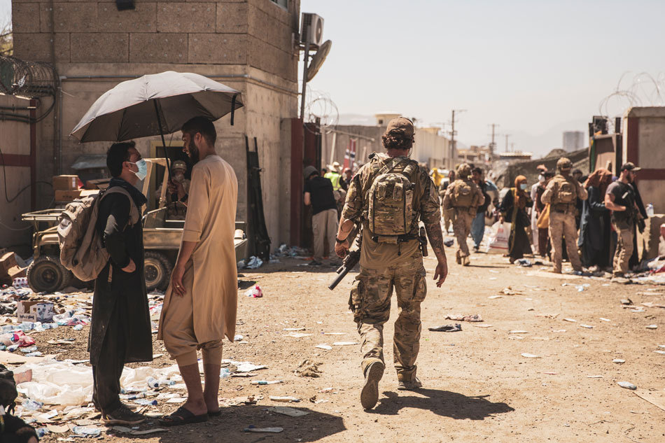 A Canadian coalition forces member walks through an Evacuation Control Checkpoint (ECC) during an evacuation at Hamid Karzai International Airport in Kabul, Afghanistan, August 24, 2021. 