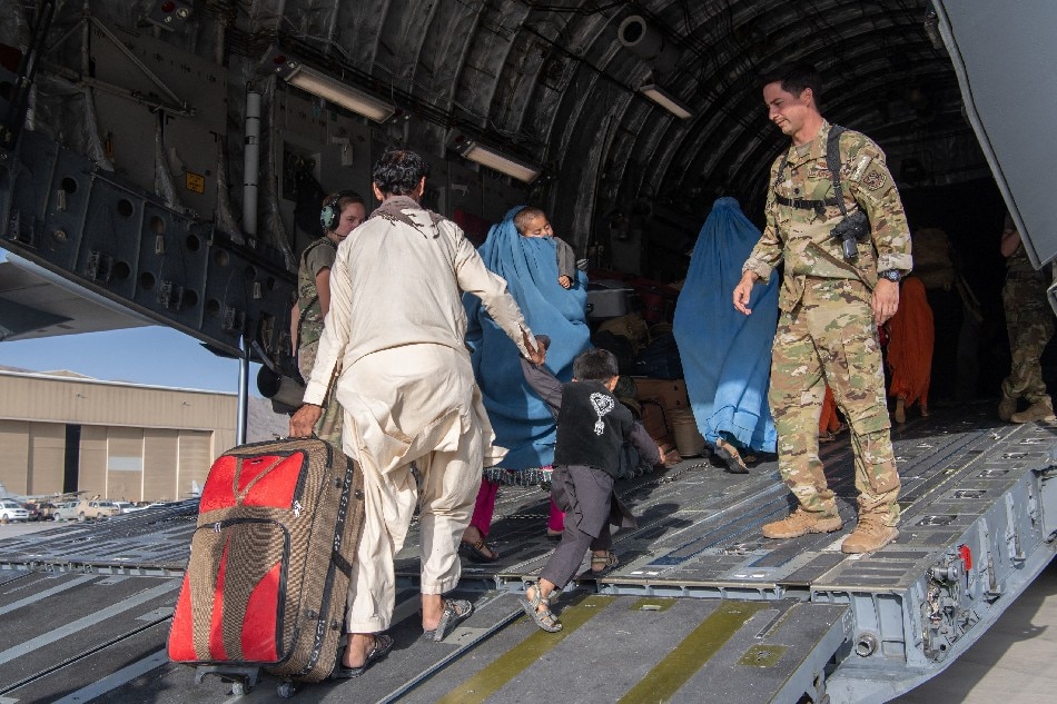 Afghan girl born on US military plane named Reach | ABS-CBN News