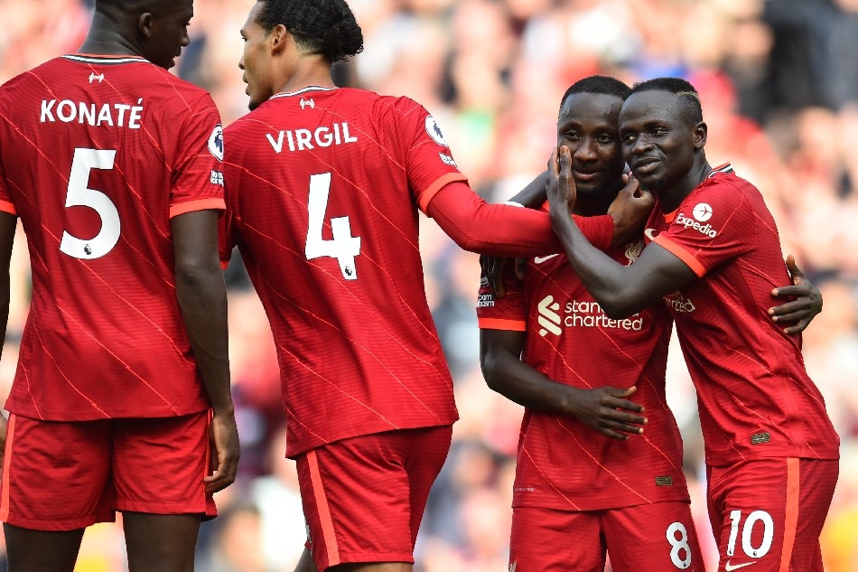Liverpool's Naby Keita celebrates scoring their third goal with Sadio Mane. Peter Powell, Reuters