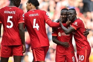 Mane reaches century as Liverpool top Premier League