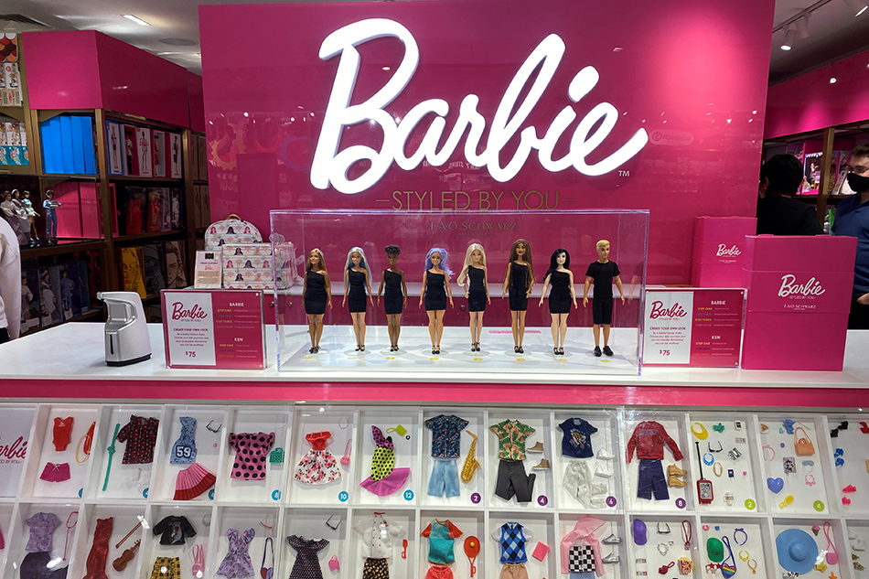 Barbie and Funko toy displays at a FAO Schwarz in New York, U.S., September 16, 2021. REUTERS/Vanessa O'Connell