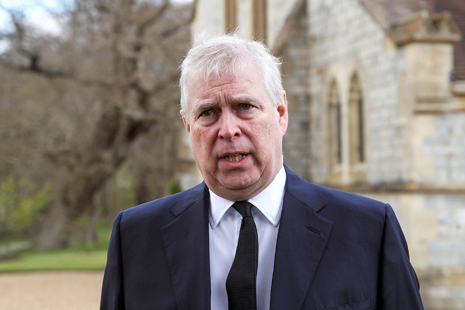 Britain's Prince Andrew speaks to the media during Sunday service at the Royal Chapel of All Saints at Windsor Great Park, Britain following the death of his father Prince Philip at age 99, April 11, 2021. Steve Parsons,PA Wire/Pool via Reuters/File