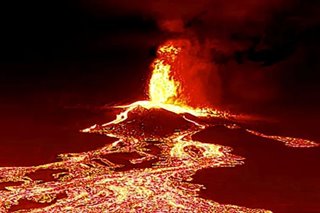 Canaries volcano lava gushes towards sea