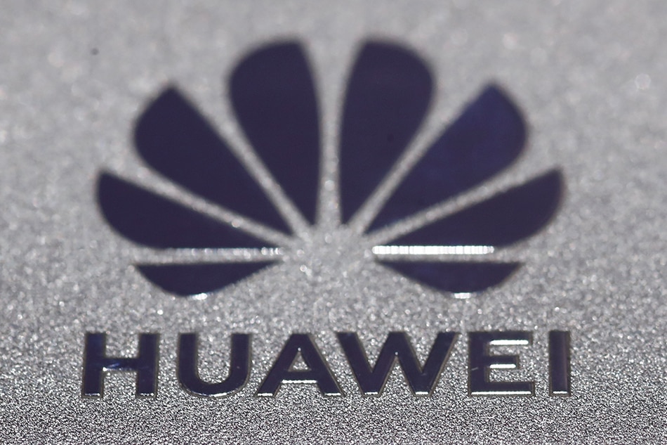 Huawei logo is seen during Munich Auto Show, IAA Mobility 2021 in Munich, Germany, September 8, 2021. Wolfgang Rattay, Reuters/File