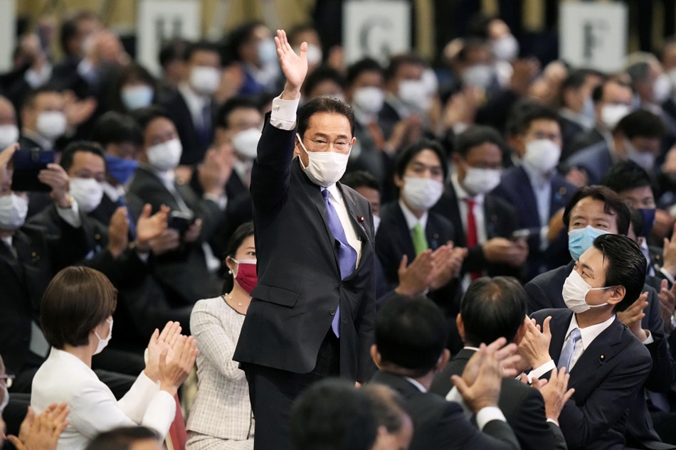 Former Japanese Foreign Minister Fumio Kishida gestures as he is elected as new head of the ruling party in the Liberal Democratic Party's (LDP) leadership vote in Tokyo, Japan, Sept. 29, 2021. Kyodo/Reuters