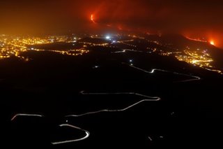Canaries volcano lava reaches sea, raising toxic gas fears