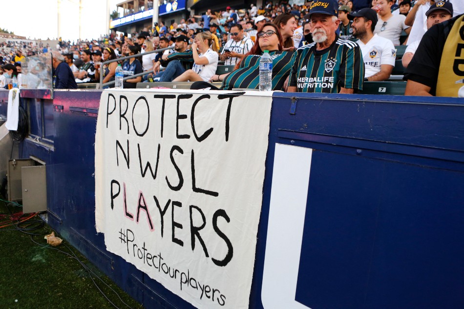 Signage supporting NWSL players is seen during a game between the Los Angeles Galaxy and the Los Angeles FC at Dignity Health Sports Park on October 03, 2021 in Carson, California. Katharine Lotze, Getty Images/AFP