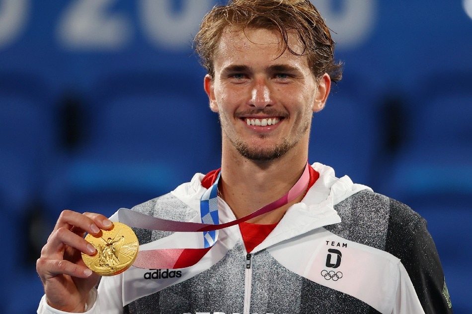 Gold medallist Alexander Zverev of Germany celebrates on the podium. File Photo. Stoyan Nenov, Reuters