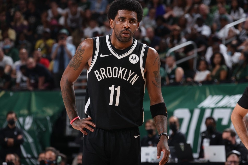 Kyrie Irving #11 of the Brooklyn Nets looks on during Round 2, Game 4 of the 2021 NBA Playoffs on June 13 2021 at the Fiserv Forum Center in Milwaukee, Wisconsin. File photo. Nathaniel S. Butler, NBAE via Getty Images/AFP
